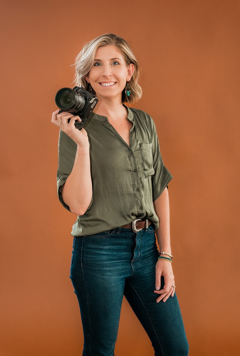 Hannah holding her camera